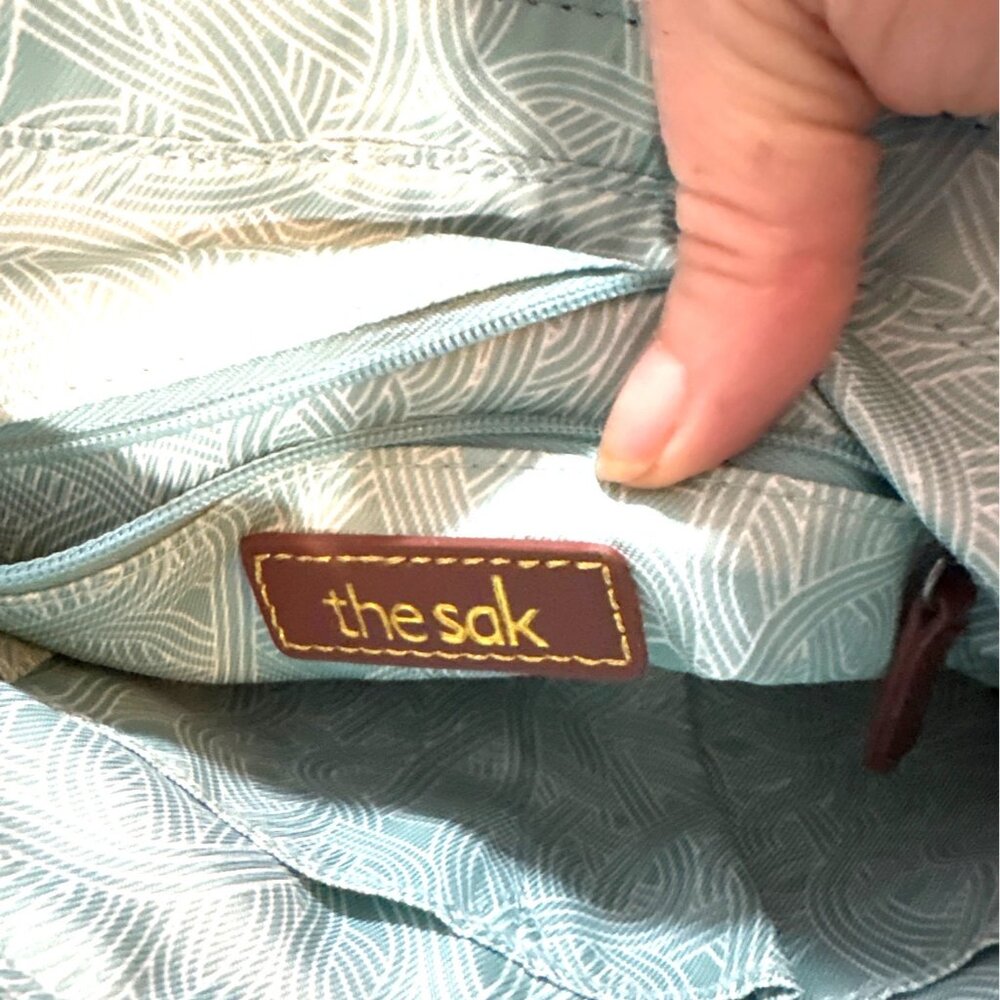 The Sak Black Leather Backpack Crossbody with Mint Patterned Interior - Picture 6 of 10